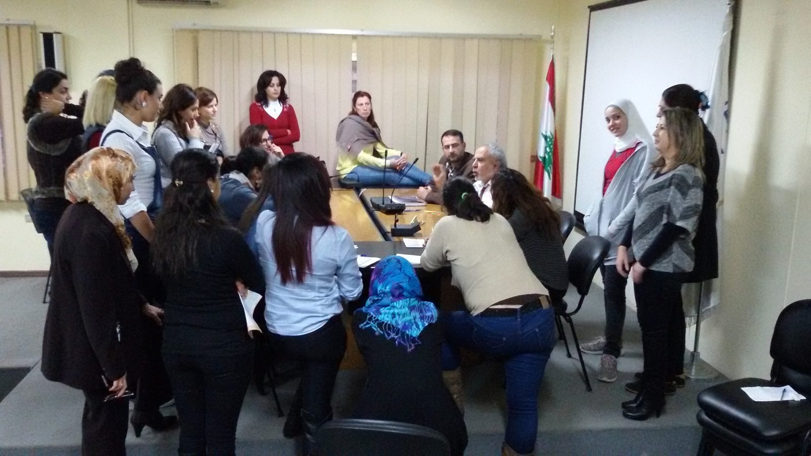 Jean Daoud surrounded by his students